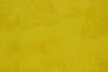 Fototapeta na wymiar yellow background texture of concrete. stone wall