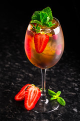 Cocktail with strawberries and mint
