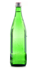 Glass bottle of mineral water isolated on white