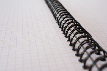 Closeup of metal binding notebook