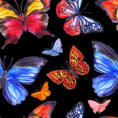 Seamless watercolor pattern of multi-colored butterflies on a black background.