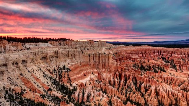 Sunset at Bryce Point. Motion in the clouds and sky over the incredible landscape at the scenic Bryce point in Bryce Canyon National Park, Utah