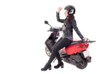 Foto op Plexiglas young woman with motorcycle isolated in white © verkoka