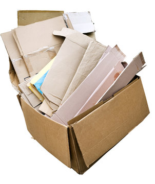 Isolated box filled with crushed cardboard for recycling.