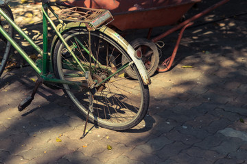 Naklejka na ściany i meble Old bicycle wheel parts background.