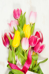 Bouquet of tulips  on the wooden background