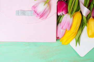 Bouquet of tulips,  gift box and blank greeting card