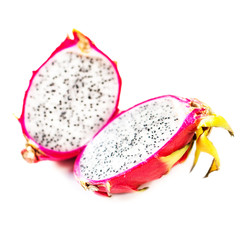 Dragon fruit cut in a half isolated on white background macro..