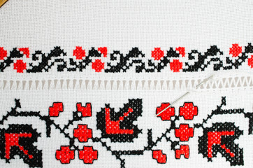Slavic red and black embroidery by cross-stitch.