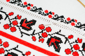 Slavic red and black embroidery by cross-stitch.
