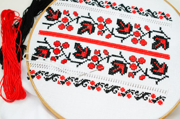 Slavic red and black embroidery by cross-stitch.
