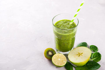 Smoothies Green. Drink Cocktail Spinach,Apple,Kiwi,Lemon,lime,avocado.Food or Healthy diet concept.Vegetarian.Copy space for Text. selective focus.