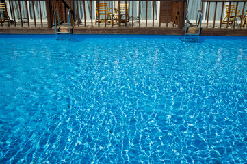 Fototapeta na wymiar Blue water in the swimming pool,