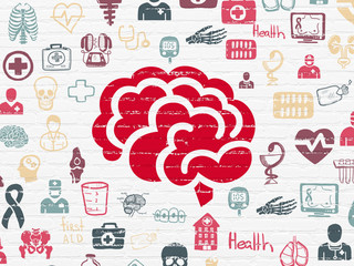 Healthcare concept: Brain on wall background