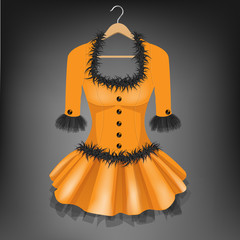 Orange dress with black fur on hanger