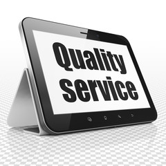 Finance concept: Tablet Computer with Quality Service on display