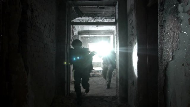 Military men with arms defending the building