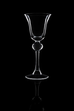 Studio photography. Wine glass, calyx on the black background.