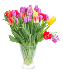 bouquet of bright spring tulips in vase isolated on white background