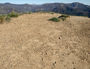 Dry soil of a dirt path. 