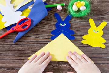 Create Easter baby gift napkin holder paper easter bunny. Made by hand. Children's Art Project, needlework, crafts for children.