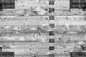 Timber wood wall texture background. Traditional construction. Monochrome.
