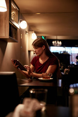 Beautiful young woman with her tablet