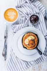 Breakfast - chocolate chip pancakes with coffee and juice