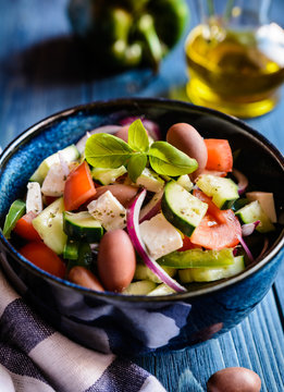 Horiatiki Salata - Traditional Greek Salad Made Of Tomato, Cucumber, Feta Cheese, Kalamata Olives, Bell Bepper And Onion