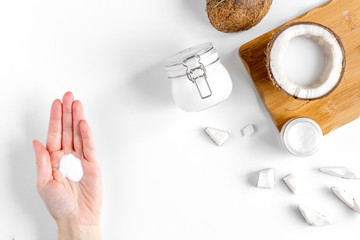 organic cosmetics with coconut on white background top view mockup