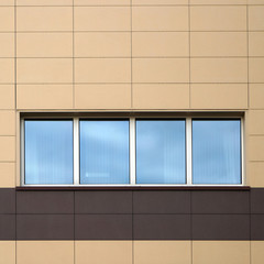 Windows and wall of modern building.