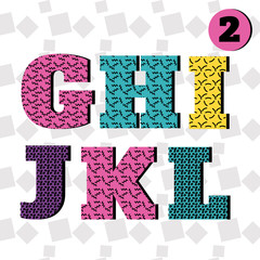 Colorful font in Memphis style. Latin letters from G to L