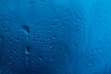 Drops of rain on glass