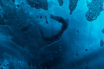 Natural soap foam on glass