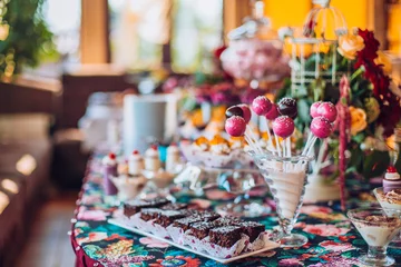 Printed kitchen splashbacks Dessert Delicious sweets on candy buffet. Lot of colorful desserts on table.
