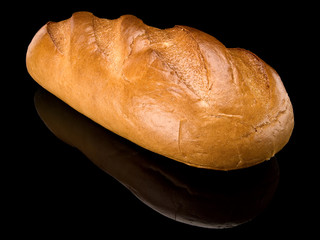 Long loaf of white, cut bread