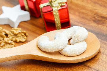 Christmas sweets on a wooden spoon