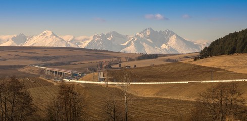 Highway with high mountains on the background/Highway D1 with High Tatra on the background in Slovakia.