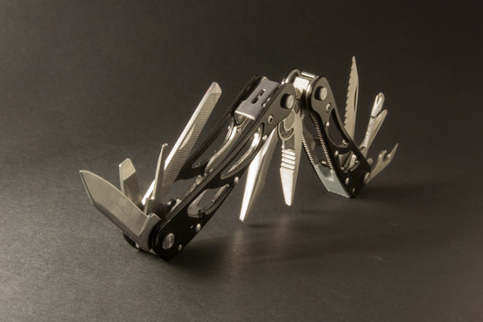 multitool on dark background