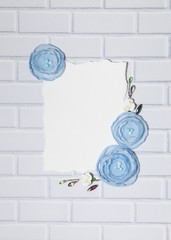 White Background With Blue Handmade Ranunculus Flowers