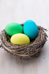 Easter eggs in the nest. Spring discount card.