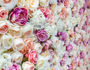 Flowers wall background with amazing red and white roses, Wedding decoration, hand made.