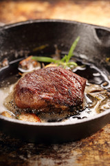 Beef steak on cast iron skillet