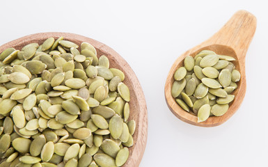 Pumpkin seeds on white background