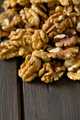 walnuts on wooden surface