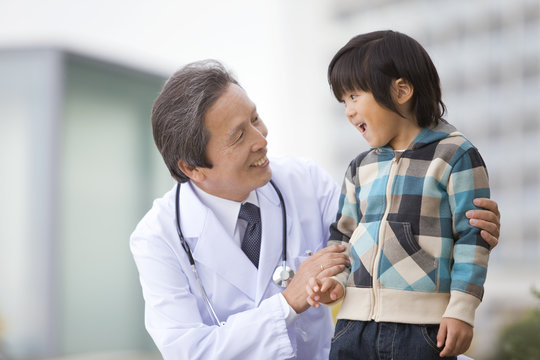 Male Doctor and Boy