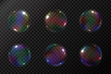 Vector realistic soap bubbles on the transparent background.