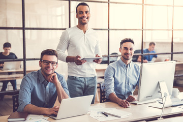 Three businessmen working