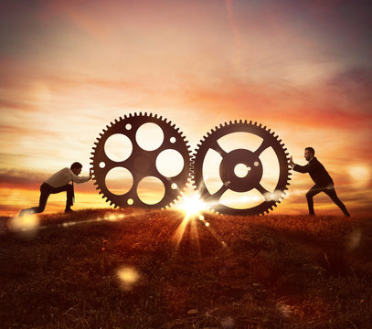 Cooperation at work concept with gears mechanism