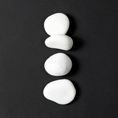 Four white pebbles